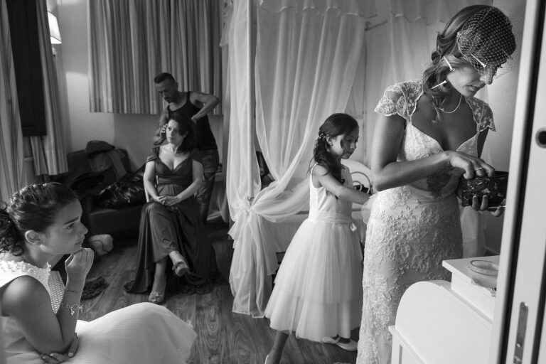 bride-getting-ready-with-her-sisters